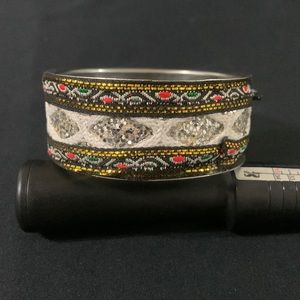 Metal and fabric handmade bracelet with colorful tribal design